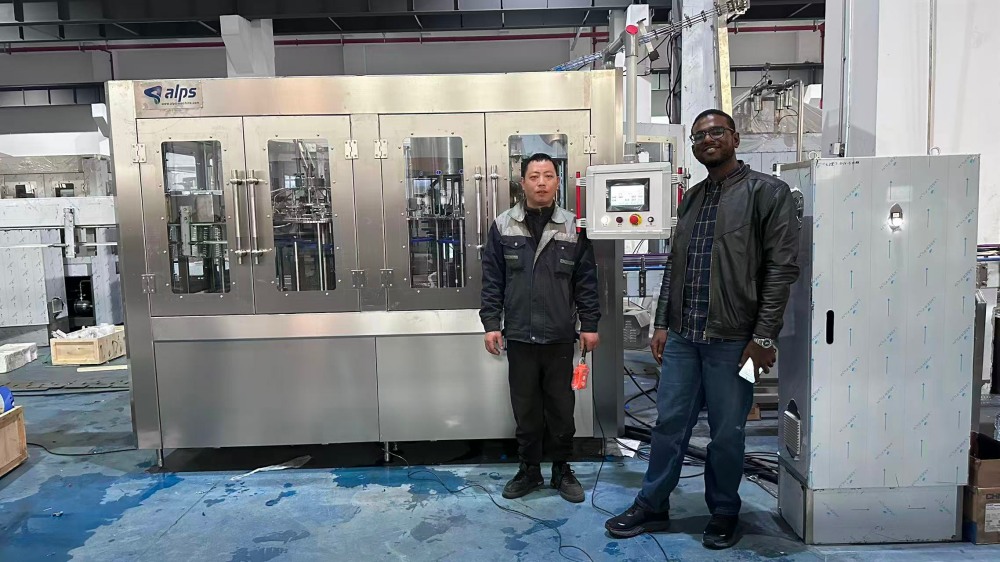 Sudanese Customer Visits Alps Machine.jpg