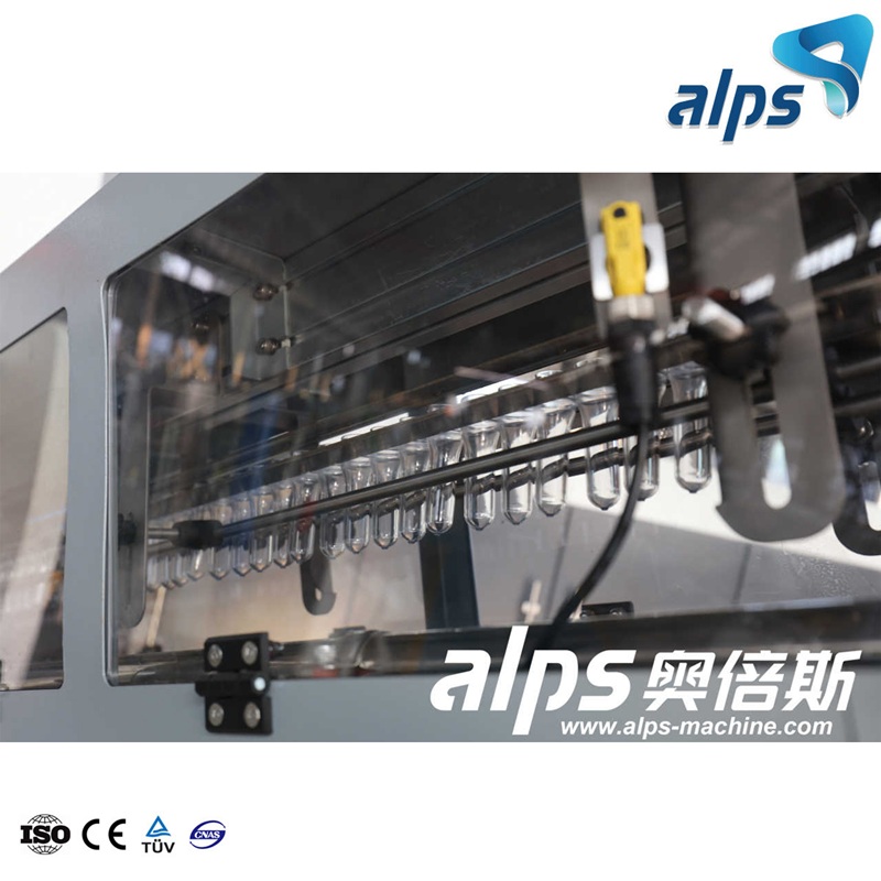 Combiblock with PET Preforms – Heating and Blowing Section in Water Bottling Line