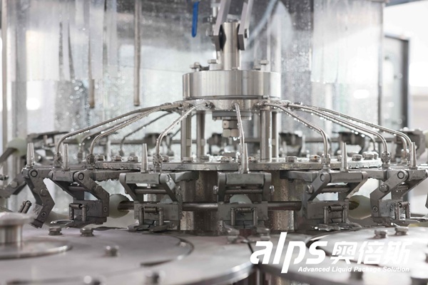 rotary-bottle-rinser-grippers-and-spray-nozzles